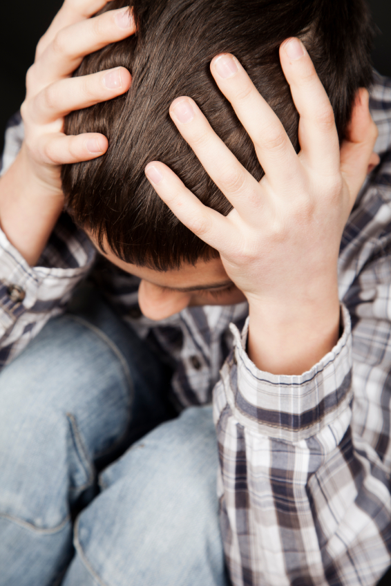 A young person feeling overwhelmed